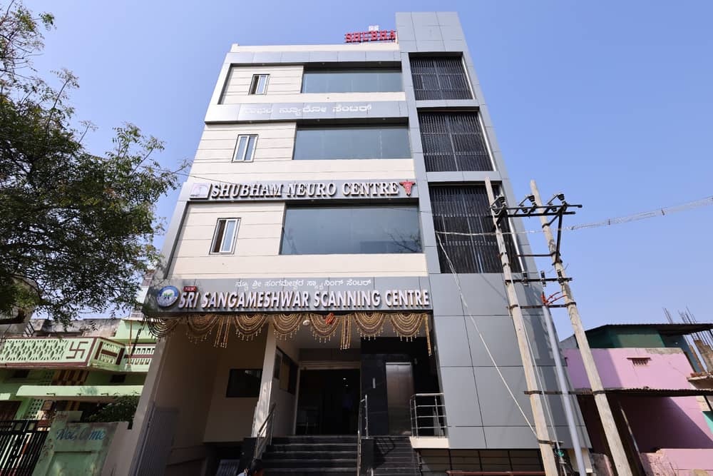 The building housing New Sri Sangameshwar Scanning Centre, with the signboard above the entrance